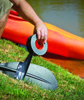 Person using Heavy Duty Black Duct Tape Double Thick Adhesive For Indoor Outdoor Use on kayak paddle near water