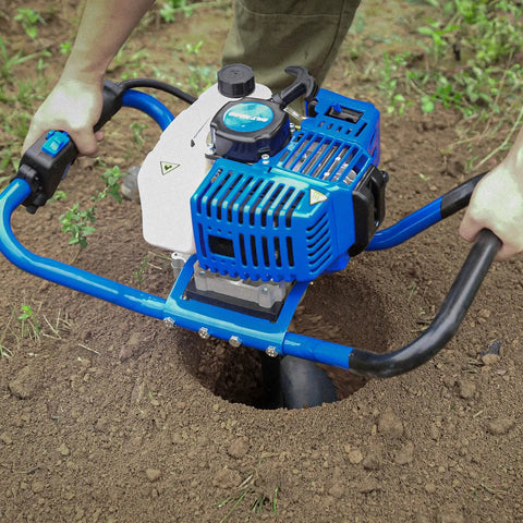 Gas Powered Post Hole Digger With 52cc 2.4 HP Two Stroke Engine drilling soil, showing blue handle and manganese steel auger bit