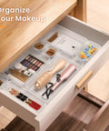 Clear Drawer Organizers Set Five Sizes Straight Up Tames Messy Vanities holding various makeup items neatly sorted in a drawer.