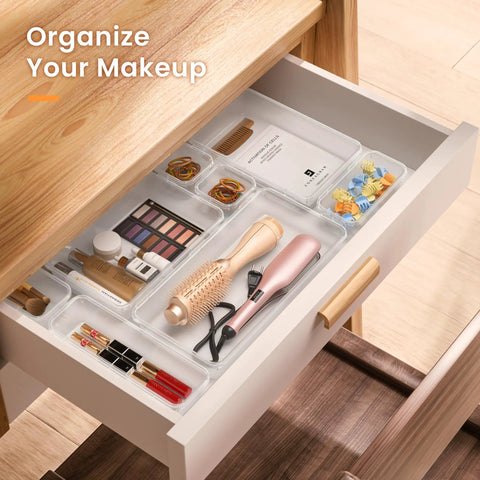 Clear Drawer Organizers Set Five Sizes Straight Up Tames Messy Vanities holding various makeup items neatly sorted in a drawer.