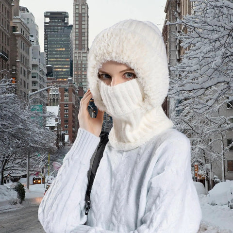 Person wearing Cozy Fleece Lined Double Layer Balaclava Beanie Set With Pompom Winter Ski Snow Hat And Circle Scarf in snowy city