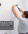 Man using Magnetic Stud Finder With Two Removable Markers Lets You Mark Up To Three Stud Locations No Batteries Needed Updated 2020