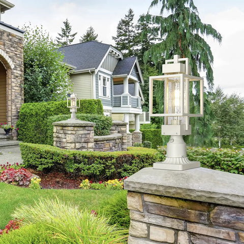 Elegant Dusk To Dawn Outdoor Post Light With Pier Mount Base, white weatherproof lantern, auto on off, in garden setting.