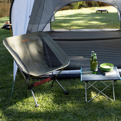Ultralight Camping Chair For Backpacking With Anti Sink Feet Ultra Portable Folding Hiking Stool outside tent on grass with table