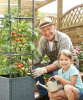 Man and girl with Raised Garden Bed Tomato Planter Box With Trellis Self Watering 4.1 Gallon Pot 31.65 Inch Trellis in garden