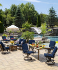 Deep Seat Outdoor Cushion Set 22 By 24 Inches Weatherproof Rainproof Fade Resistant Sapphire Blue Leala For Patio Chairs And Sofas beside a swimming pool on a sunny day.
