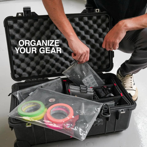 Clear Zipper Pouch Set Four Pack For Cables USB Adapters And Small Tech Gear Grab And Go Travel Organizers in a camera case