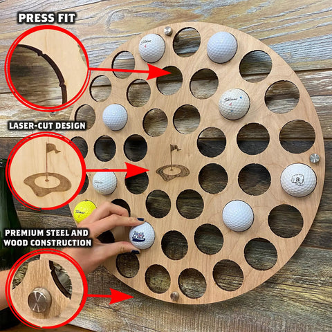 Charred Finish Golf Ball Display Holder And Collector Case Holds 42 Balls, wall-mounted showing laser-cut design and golf balls.