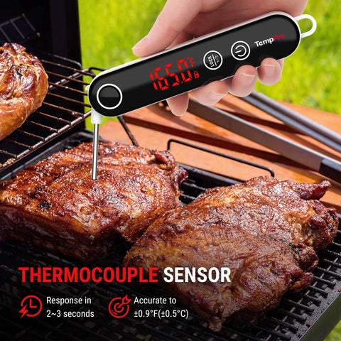 Ultra Fast Instant Read Meat Thermometer With 4 Inch Probe Digital Thermocouple Sensor Delivers 2 To 3 Second Readouts At 0.9 F Accuracy 14 F To 572 F Range Lock Function Ideal For Grillin Smokin Fryin Candy Oil And Kitchen displayed measuring a steak on a grill.