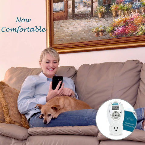 Woman relaxing on sofa with dog and smartphone, featuring Heavy Duty Programmable Outlet Thermostat For Space Heaters And Window Air Conditioners 120V 15A Four Daily Scheduler Slots Weekday Weekend Programming Plug And Play FCC Certified Built Tough For Home Comfort.