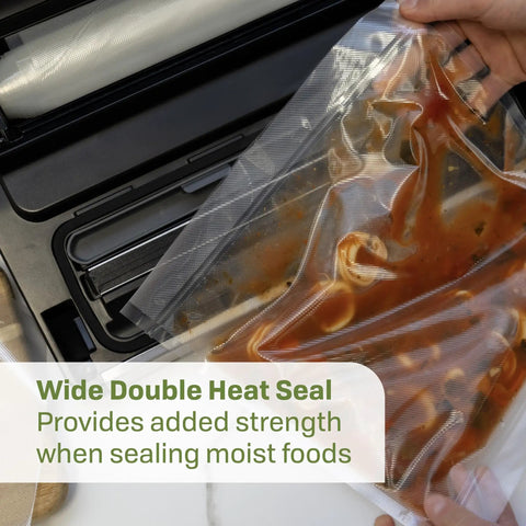 Person using Game Changer Vacuum Sealer For Home Food Storage With LiquidLock Tech And Liquid Mode to seal liquid in a bag