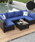 7 Piece Outdoor Patio Sectional Wicker Rattan Set In Coffee Blue With Waterproof Cushions by poolside on wooden deck