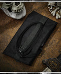 Long Sword Bag For Katana Carrying Case With Shoulder Strap Dope Ninja Sword Sheath folded on a table with skull decor