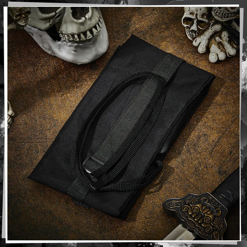 Long Sword Bag For Katana Carrying Case With Shoulder Strap Dope Ninja Sword Sheath folded on a table with skull decor