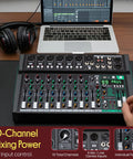 Ten Channel Studio DJ Mixer With Bluetooth And XLR Combo Mic Inputs USB MP3 Playback PC Recording DSP Effects LED Level Meters Smooth Dials And Faders For Live Shows Home Studio And Podcast Setups on desk with laptop and headphones