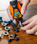 Micro Precise Gel Glue with Quick Set Cyanoacrylate Adhesive being applied to a necklace, showcasing the precise dispensing tool.