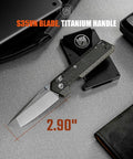 Ultra Thin EDC Knife With 2.9 Inch S35VN Blade And Titanium Handle, Precision Ground Tanto on grey surface.