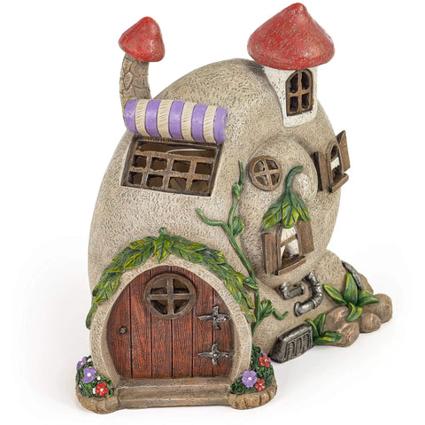 Snail Shell Fairy Cottage Solar Powered LED Light for Outdoor Decor, with red roofs and decorative plants.