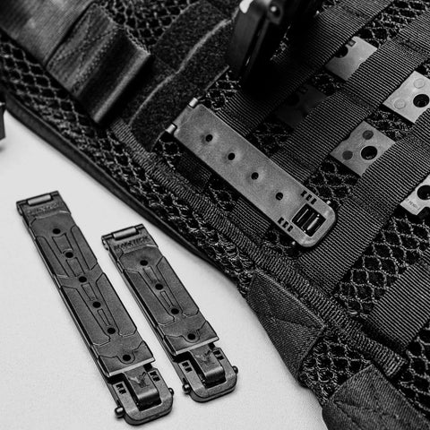 Rock Solid 3 Inch Molle Lok Clips on tactical vest webbing, durable nylon attachment hardware for gear organization.