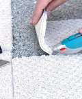 Ten Pack Utility Knife Blades Refills For Box Cutters, Heavy Duty SK5 High Carbon Steel Razor Blades being used to cut carpet