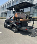 Premium Four Seater Electric Golf Cart Delivers Smooth All Terrain Ride Perfect For Weekend Warriors And Community Cruising Featuring Extended Battery Life Spacious Gray Interior And Eco Friendly Design, shown from the back.