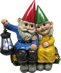 Light Of Our Love Gnome Couple Solar Lantern Statue sitting on a log with yellow and blue lights for outdoor yard decor