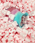 Pink Packing Peanuts For Shipping And Moving, 14 Cubic Feet Antistatic Void Fill Cushioning Supplies in a pile with a colorful vase.