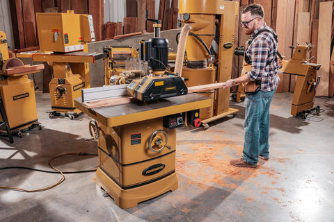 Heavy Duty Rock Solid 3 Roll Power Feeder With 1 HP Motor And 460 Volt 3 Phase System for reliable material feed in a workshop.