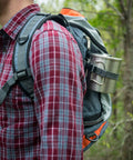 900 Series Backpacking Pot Lightweight Stainless Steel Camping Pot attached to backpack in outdoor setting