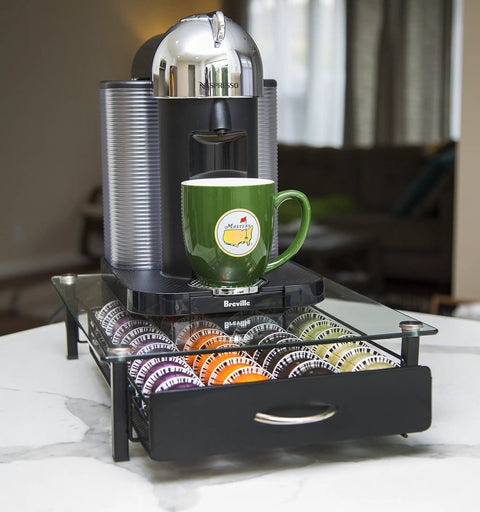 Vertuoline Coffee Pod Holder With Tempered Glass Drawer Deluxe Size Holds Up To 40 Pods For VertuoLine Capsules Keeps Your Countertop Organized And Clutter Free Boss Level Glass Drawer Organizer For Espresso Pods with machine and green mug on top.