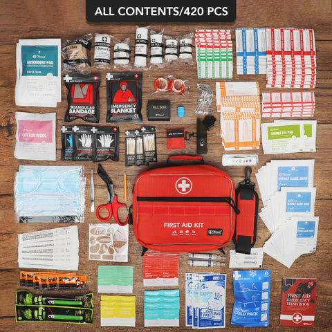 Red first aid kit with 430-piece contents displayed around it; includes bandages, gauze, scissors.
