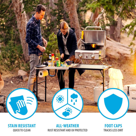Folding Tailgate Table With Grill Rack For Outdoor Camping And Grilling, 5 Foot Portable Prep Station in use at campsite