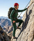 Climber on rock face using Half Inch By One Hundred Foot Static Polyester Arborist Rope With 9000 Lbs MBS And 48 Strands Beast Of A Rope