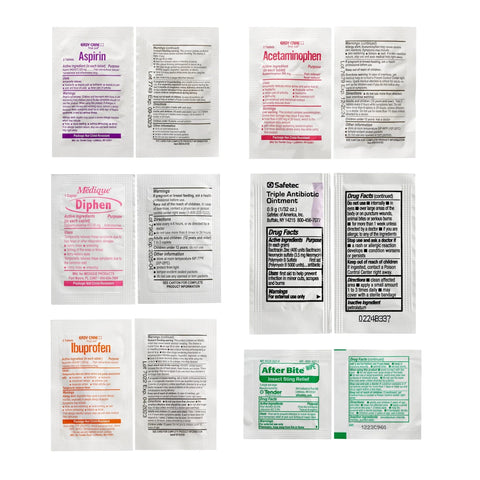 First aid kit contents: assorted OTC medicine sachets in white packaging for hiking.