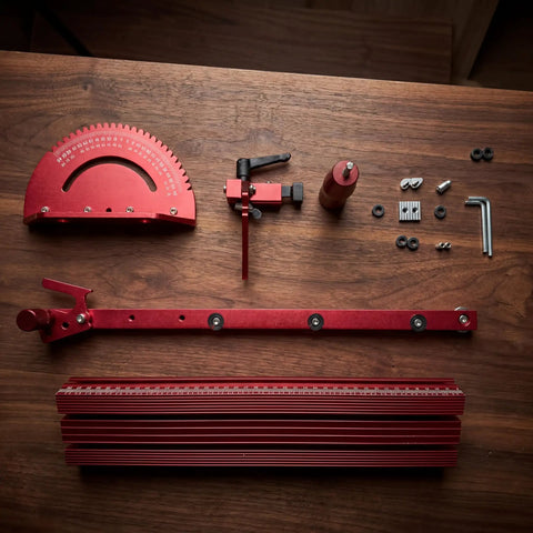 Precision Adjustable Miter Gauge For Table Saw With Solid Aluminum Fence And Smooth Ball Bearing Slide For Dead Straight Crosscuts Bullseye Miters And Router Tables, red aluminum parts arranged on wooden surface.