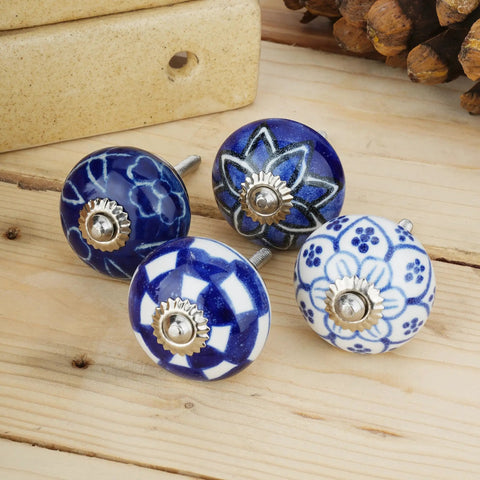 Top Shelf 10 Pack Ceramic Cabinet Knobs With Blue And White Printed Antique Patterns Sweet Glossy Finish Drawer Pull Handles For Kitchen Cupboards And Wardrobes Legit Home Decor displayed on wooden surface.