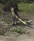 Heavy Duty Triple Chain Shrub And Clump Remover Tool With Four Foot Pulling System pulling a shrub from the ground