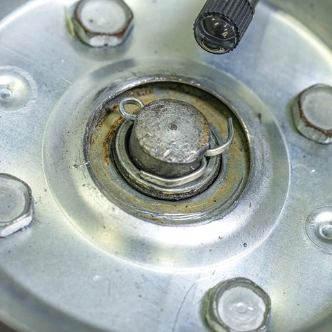 Cotter pin in use to secure assembly on metal surface from 555 Piece Cotter Pin Set For Automotive And Trailer Projects Zinc Plated Steel Premium Quality Straight Hairpins And Split Pins To Lock Castle Nuts In Place By NEIKO
