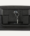Close-up of black fire resistant waterproof safe chest with mechanical key, 0.22 cu ft, showing lock and two keys.