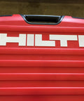 Red carrying case for TE 30 C AVR Rotary Hammer Drill with 120 Volt Power and 8.6 Amp, showing durability and brand logo.