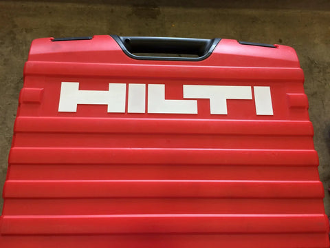 Red carrying case for TE 30 C AVR Rotary Hammer Drill with 120 Volt Power and 8.6 Amp, showing durability and brand logo.