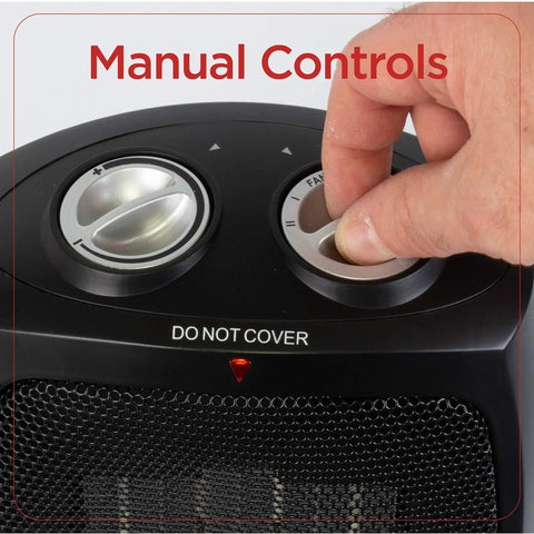 Manual controls on Portable Desk And Room Space Heater With Carry Handle, 1500W, Lightweight 2.8 Lb Personal Heater showing hand adjusting