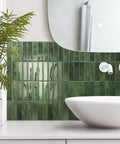 Peel And Stick Backsplash Tile Set, 5 Sheets Of 11.43 X 9 Inches, 3D Adhesive, No Glue Needed, Quick Install For Kitchen And Bathroom, Sefrou Green Finish behind a white sink in a modern bathroom setting.