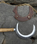 Hand Forged Athame Crescent Blade Sickle For Ritual Work And Herb Harvesting A Versatile Witchy Tool displayed on wooden surface