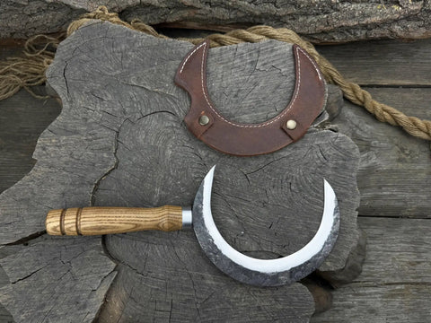 Hand Forged Athame Crescent Blade Sickle For Ritual Work And Herb Harvesting A Versatile Witchy Tool displayed on wooden surface