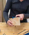 Kreg KPHA308 pocket hole drill bit with stop collar and gauge; blue tool mounted on a wooden block