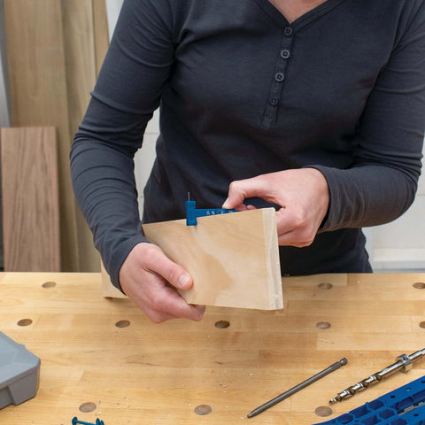 Kreg KPHA308 pocket hole drill bit with stop collar and gauge; blue tool mounted on a wooden block