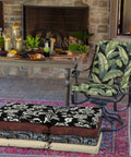 All Weather Outdoor Midback Chair Cushion In Onyx Cebu, 18 x 16.5 Inch Seat Pad And 18 x 20 Inch Back Pad, stacked on outdoor rug.