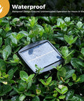1.2W Solar Panel for Patio Umbrella With 4-Pin Connector Waterproof Replacement Charging Kit resting on wet foliage