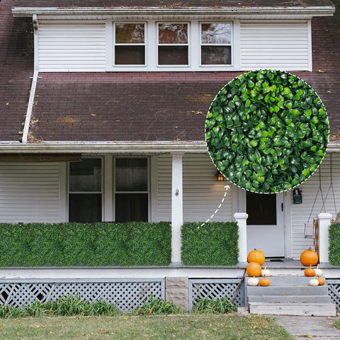Privacy Fence Screen With Realistic Faux Boxwood Ivy Panels 60 By 140 Inches Covering 58.5 Sq Ft on a house exterior with pumpkins.